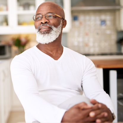 man smiling with all-on-4-implants